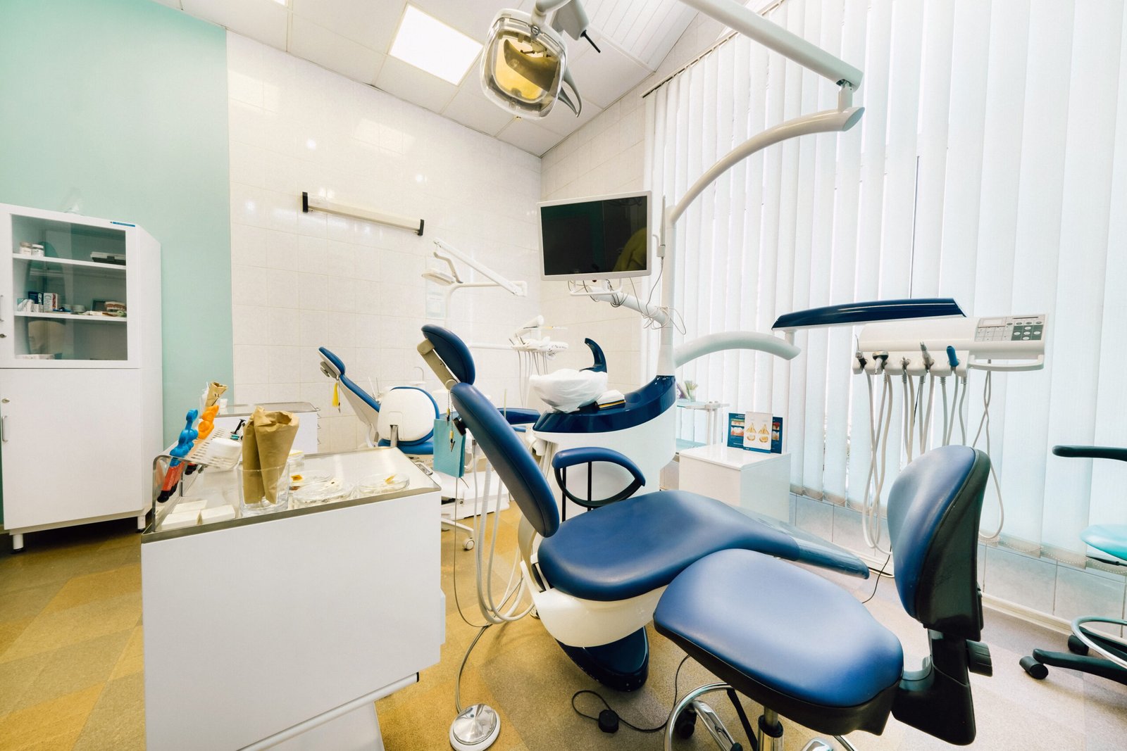 An empty chair in the dentist's office. Empty dentist's office.