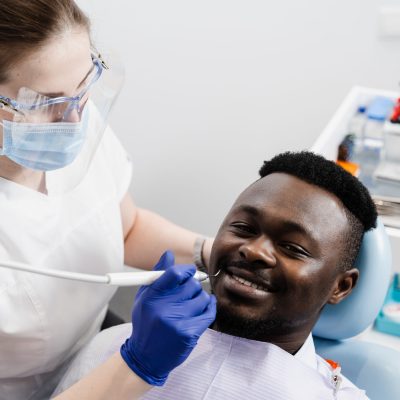 man-receiving-dental-treatment-in-a-bright-clinic-2026-04-04-23-51-58-utc